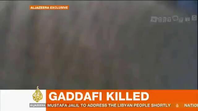 В това видео е заснета подигравката с трупа на либийският лидер !