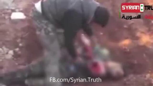 Лидер на сирийските бунтовници яде сърце на убит