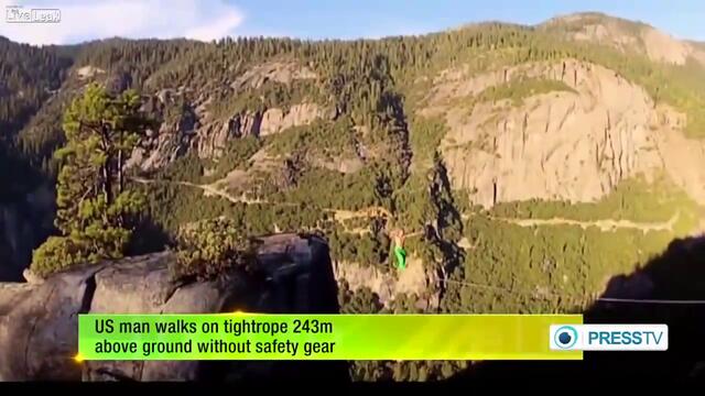 НЕВЕРОЯТНО! САЩ мъж, който ходи по тънко въже 243 м над земята, без осигурително въже