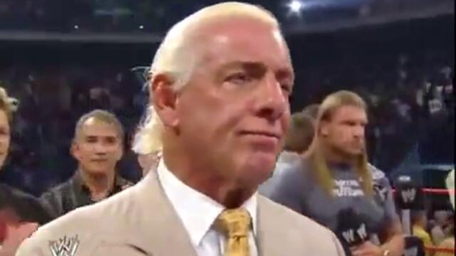The undertaker and Vince hugs  to Rick Flaer