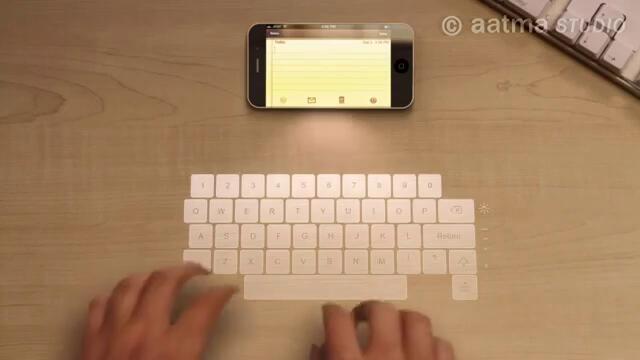 iPhone_5_Features_[2_of_4]_-_Laser_Keyboard_-_YouTube