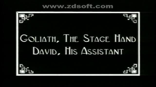 Чарли Чаплин в Зад екрана (1916)